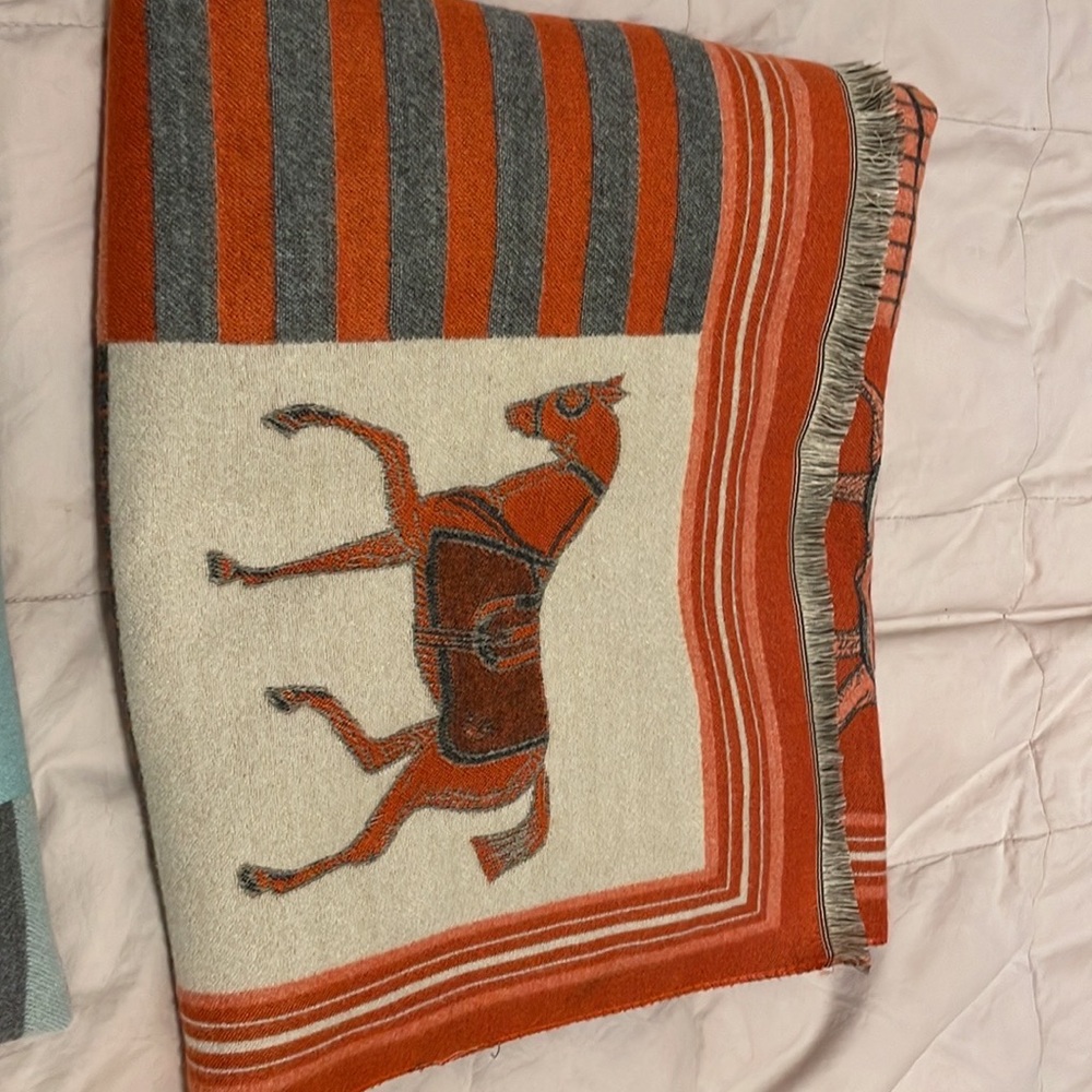 Never worn orange, cream, gray equestrian wrap.